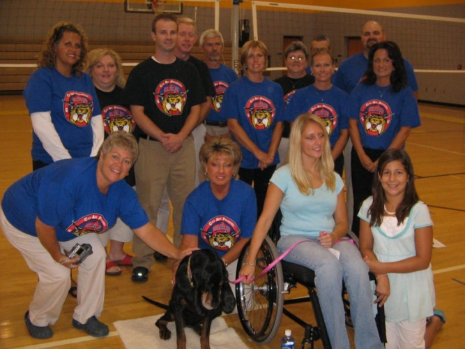 Gabe, Izzy, and her sister, Madeline, pose with staff at Clinton, IN Gabe, Izzy, and her sister, Madeline, pose with staff at Clinton, IN.